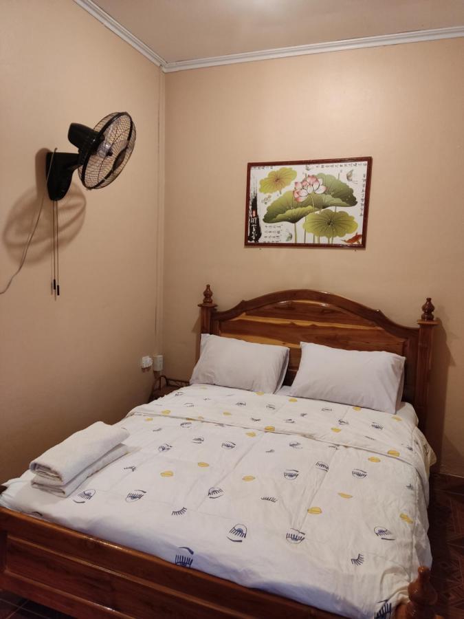 Erawan Guesthouse Pakse Buitenkant foto
