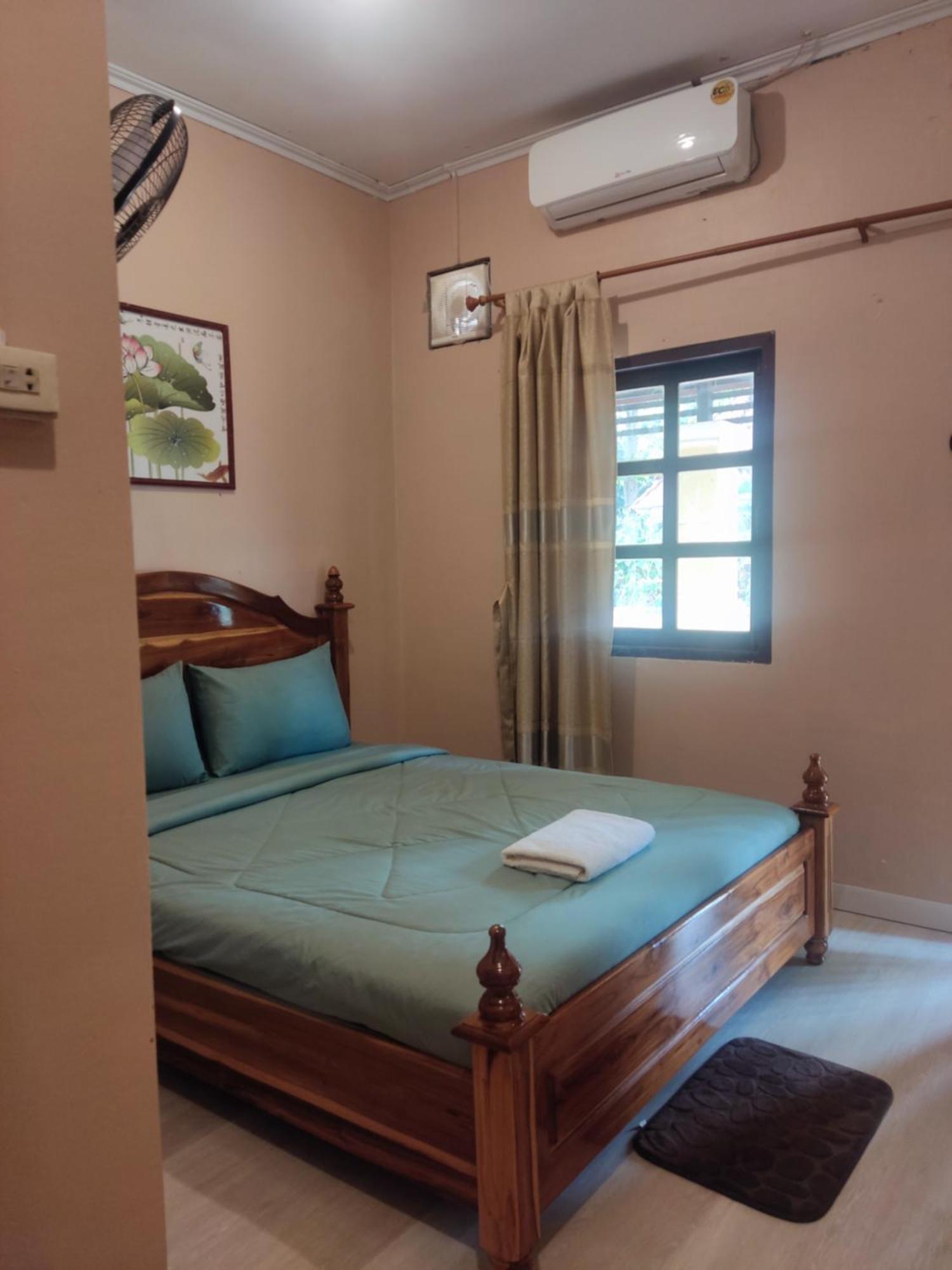 Erawan Guesthouse Pakse Buitenkant foto