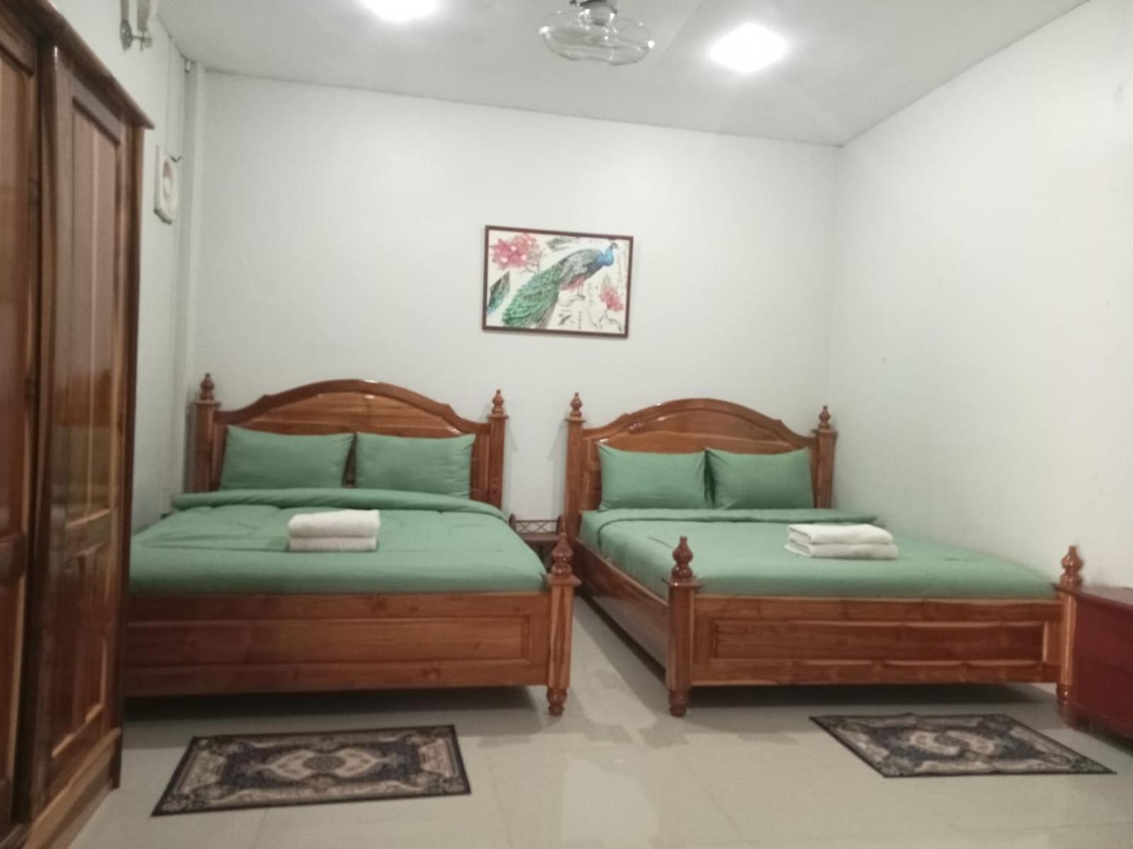 Erawan Guesthouse Pakse Buitenkant foto